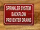 NYC SPRINKLER SYSTEM BACKFLOW PREVENTER DRAINS SIGN