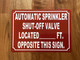 AUTOMATIC SPRINKLER SHUT OFF VALVE LOCATED FT OPPOSITE THIS COMPLIANCE SIGN COMPLIANCE SIGN
