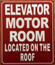 HPD ELEVATOR MOTOR ROOM LOCATED IN THE ROOF SIGN SIGN
