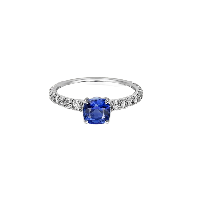 Cartier Precious colored stones — representative 1895 solitaire, cushion-cut sapphire, paved 