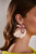 Blush Petal Bow Earrings with Baguette Stones Model