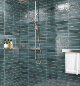 Contemporary bathroom featuring Urban Blue Glossy Metro Wall Tiles in a vertical stack layout, showcasing their deep blue tones and high-gloss finish. Contemporary bathroom featuring Urban Blue Glossy Metro Wall Tiles in a vertical stack layout, showcasing their deep blue tones and high-gloss finish.