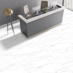Alpine White marble effect matt porcelain tile 60x120cm with subtle grey veining installed in a modern office space interior