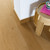 Quick-Step Alpha Vinyl Blos – Coast Oak Honey Rigid Vinyl Flooring (AVSPU40320) - Premium Quick-Step collection featuring oak luxury vinyl tile flooring with waterproof technology and easy click-fit installation