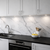 Celestial Veins glossy marble effect porcelain tile 60x120cm featuring white tones with elegant grey veining in a modern luxury kitchen splashback.