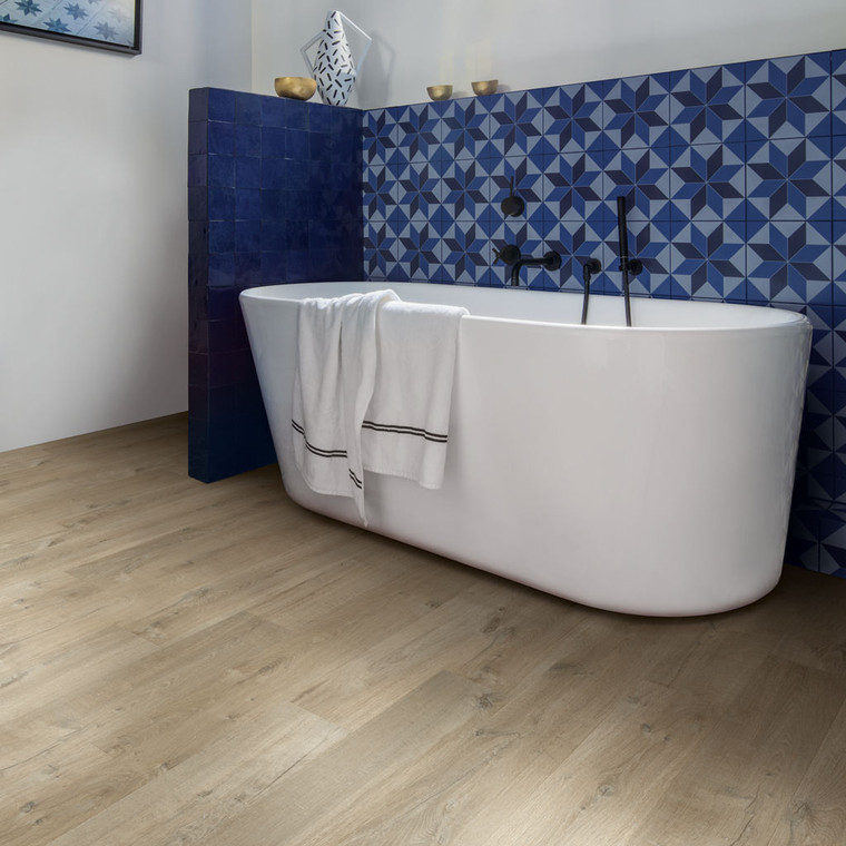 Quick‑Step Impressive Soft Oak Light Brown Planks 8mm Laminate Flooring (IM3557) - Premium Impressive collection featuring oak luxury vinyl tile flooring with waterproof technology and easy click-fit installation