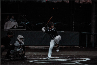 Connor Curtis hitting during a baseball game