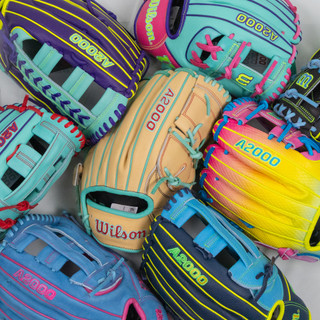 Baseball gloves laid out for comparison