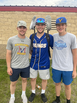 Daniel Kibler with his 2 brothers post-game