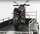 ACEBIKES - TyreFix Motorcycle Tie Down Ratchet Strap System on a trailer