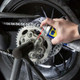 WD-40 Specialist Motorbike Chain Cleaner shown in use
