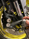 MOTOREX Motorcycle Power Brake & Clutch Cleaner spray in use on calliper