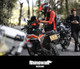 Orange motorcycle tank bag fitted to adventure motorcycle