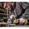 DeWalt DCW682B 20V MAX XR Cordless Brushless Biscuit Joiner (Tool Only) showing in use cutting biscuits into laminated lumber
