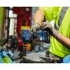 Bosch GDX18V-1860CN 18V 1/4 inch & 1/2 inch Cordless Brushless Two-In-One Bit/Socket Impact Driver/Wrench (Tool Only) showing in use fastening bolts through a metal bracket into steel pipes