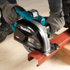 Makita CS002GZ 40V MAX XGT Cordless Brushless 7-1/4 Inch Metal Circular Saw (Tool Only) showing in use cutting through a steel u track Makita CS002GZ 40V MAX XGT Cordless Brushless 7-1/4 Inch Metal Circular Saw (Tool Only) showing in use cutting through a steel u track