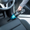 Makita DCL180ZB 18V LXT Cordless Stick Vacuum Cleaner (Tool Only) showing vacuum in use cleaning car seat clean Makita DCL180ZB 18V LXT Cordless Stick Vacuum Cleaner (Tool Only) showing vacuum in use cleaning car seat clean