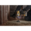 DeWalt DCD999P2 FLEXVOLT 20V MAX 1/2 inch Brushless Hammer Drill / Driver Kit  showing in use drilling a hole in the sub-floor DeWalt DCD999P2 FLEXVOLT 20V MAX 1/2 inch Brushless Hammer Drill / Driver Kit  showing in use drilling a hole in the sub-floor