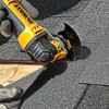 DeWalt DWA4214 Multi-Material Cutting Oscillating Semicircle Blade showing blade in use cutting asphalt shingles