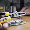 Klein Tools J207-8CR 8-1/2 Inch All-Purpose Needle Nose Pliers with Crimper showing in use cutting machine screw with edge cutter Klein Tools J207-8CR 8-1/2 Inch All-Purpose Needle Nose Pliers with Crimper showing in use cutting machine screw with edge cutter