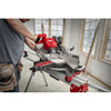 Milwaukee 48-40-1220 12-inch x 44T General Purpose Wood Cutting Circular Saw Blade showing in use cutting moulding with miter saw (miter saw sold separately)