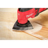 Milwaukee 49-25-2025 OPEN-LOK 25pc 3-1/2-inch Triangle Universal Fit Multi-Tool Oscillating Sanding Paper Set showing in use sanding finish off of baseboard