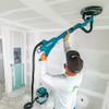 Makita DSL801ZX1 18V Brushless 8-7/8in Drywall Sander (Tool Only) showing in use sanding a ceiling with a vacuum connected (Battery & vacuum are sold separately) Makita DSL801ZX1 18V Brushless 8-7/8in Drywall Sander (Tool Only) showing in use sanding a ceiling with a vacuum connected (Battery & vacuum are sold separately)