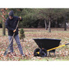 Bosch GHJ12V-20MN12 12V Max Heated Jacket Kit - Medium showing being worn while raking leaves