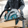 Makita HS013GZ 40V MAX XGT Cordless Brushless 16-5/16in Circular Saw (Tool Only) showing in use making a rip cut of a wood beam (Battery sold separately) Makita HS013GZ 40V MAX XGT Cordless Brushless 16-5/16in Circular Saw (Tool Only) showing in use making a rip cut of a wood beam (Battery sold separately)