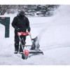 Milwaukee 3036-22HD M18 FUEL Cordless 21 inch  Auger Propelled Dual Battery Single Stage Snow Blower Kit showing in use clearing a driveway