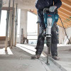 Bosch DH1020VC 15 Amp SDS-Max Demolition Hammer on the job hammering a floor Bosch DH1020VC 15 Amp SDS-Max Demolition Hammer on the job hammering a floor