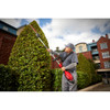 Milwaukee 49-16-2719 M18 FUEL QUIK-LOK Articulating 20 Hedge Trimmer Attachment trimming a hedge row Milwaukee 49-16-2719 M18 FUEL QUIK-LOK Articulating 20 Hedge Trimmer Attachment trimming a hedge row