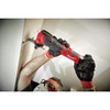 Milwaukee 2526-20 M12 FUEL Brushless Oscillating Multi-Tool cutting into drywall (battery and extra attachments sold separately)