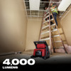 Milwaukee 2366-20 M18 ROVER 4000 Lumen Dual-Power Flood Light illuminating a work area (extension cord not included)