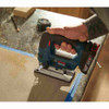 Bosch JSH180B 18V Cordless Top-Handle Jig Saw (Tool Only) showing cutting wood on a horizontal pattern