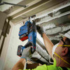Bosch GBH18V-26DN 18V EC Cordless Brushless SDS-Plus Bulldog 1 inch Rotary Hammer (Tool Only) showing drilling in ceiling through steel stud with dust extractor (Sold Separately)