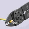 Knipex 9721215SB 9-1/4 inch Crimping Pliers showing in use while crimping  terminal fitting Knipex 9721215SB 9-1/4 inch Crimping Pliers showing in use while crimping  terminal fitting