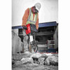 Milwaukee MXF368-1XC MX FUEL Cordless Demolition Breaker Kit showing in use breaking up a slab of concrete