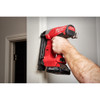 Milwaukee 48-11-1835 M18 REDLITHIUM HIGH OUTPUT CP3.0 Battery showing battery in use on nailer to attach door casing
