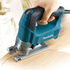 Makita 4329K 3.9 Amp Variable Speed Orbital Jig Saw with D-Handle showing in use cutting flat stock with a 45 degree bevel Makita 4329K 3.9 Amp Variable Speed Orbital Jig Saw with D-Handle showing in use cutting flat stock with a 45 degree bevel