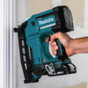 Makita DBN600Z 18V LXT Cordless 16-Gauge 2-1/2 inch Finish Nailer (Tool Only) showing in use nailing casing boards around a door way Makita DBN600Z 18V LXT Cordless 16-Gauge 2-1/2 inch Finish Nailer (Tool Only) showing in use nailing casing boards around a door way
