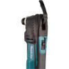 Makita DTM51Z 18V LXT Cordless Multi-Tool (Tool Only) showing focused on the locking/unlocking leaver