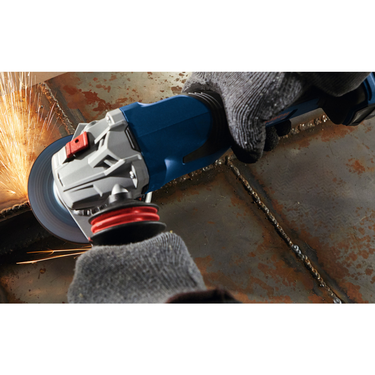 Bosch GWS18V-13PN PROFACTOR 18V 5 inch - 6 inch Angle Grinder with Paddle Switch (Tool Only) showing in use grinding welded seams