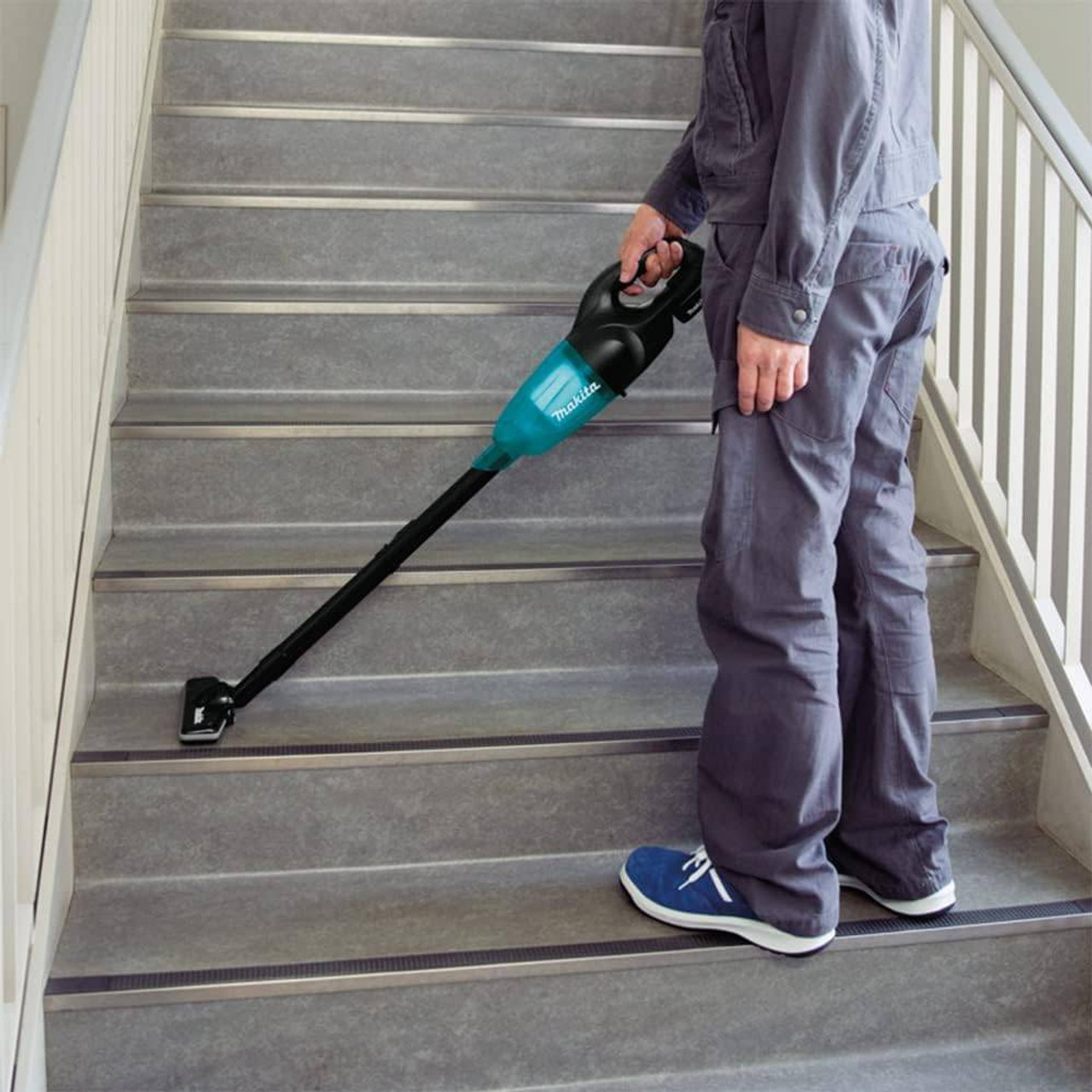 Makita DCL180ZB 18V LXT Cordless Stick Vacuum Cleaner (Tool Only) showing vacuum in use cleaning car seat clean Makita DCL180ZB 18V LXT Cordless Stick Vacuum Cleaner (Tool Only) showing vacuum in use cleaning car seat clean