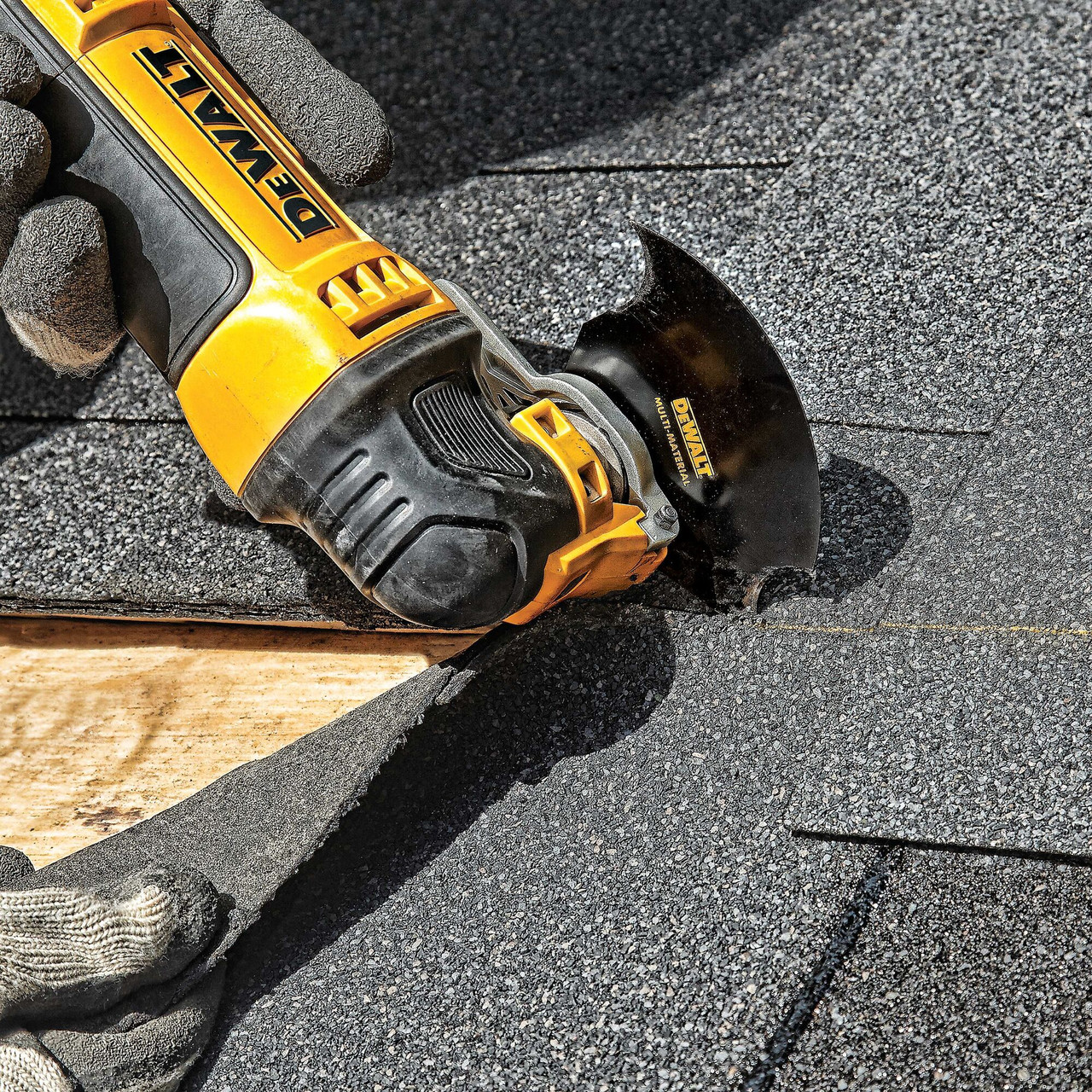 DeWalt DWA4214 Multi-Material Cutting Oscillating Semicircle Blade showing blade in use cutting asphalt shingles DeWalt DWA4214 Multi-Material Cutting Oscillating Semicircle Blade showing blade in use cutting asphalt shingles