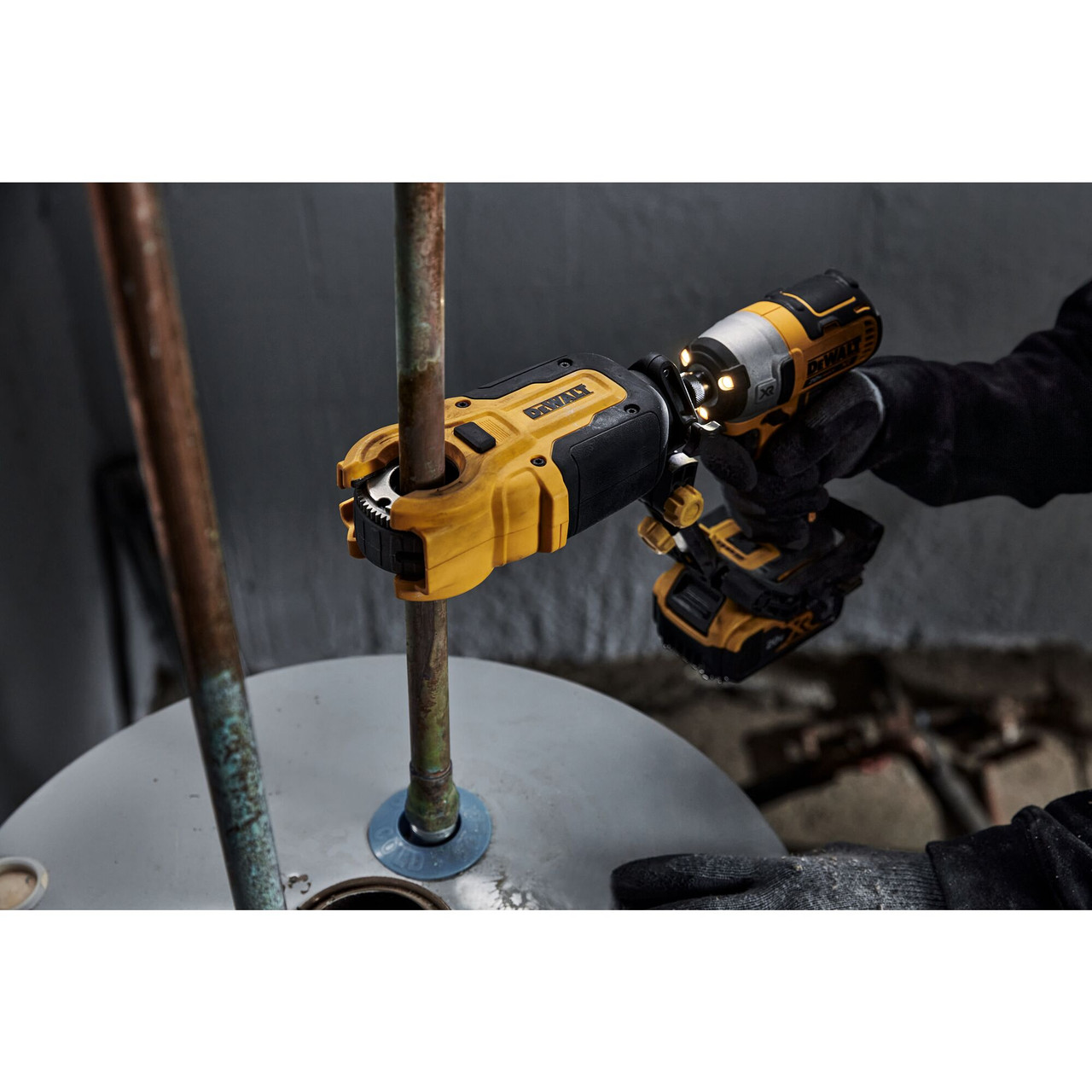 DeWalt DWACPRIR IMPACT CONNECT Copper Pipe Cutter Attachment showing in use cutting copper pipe going into hot water type