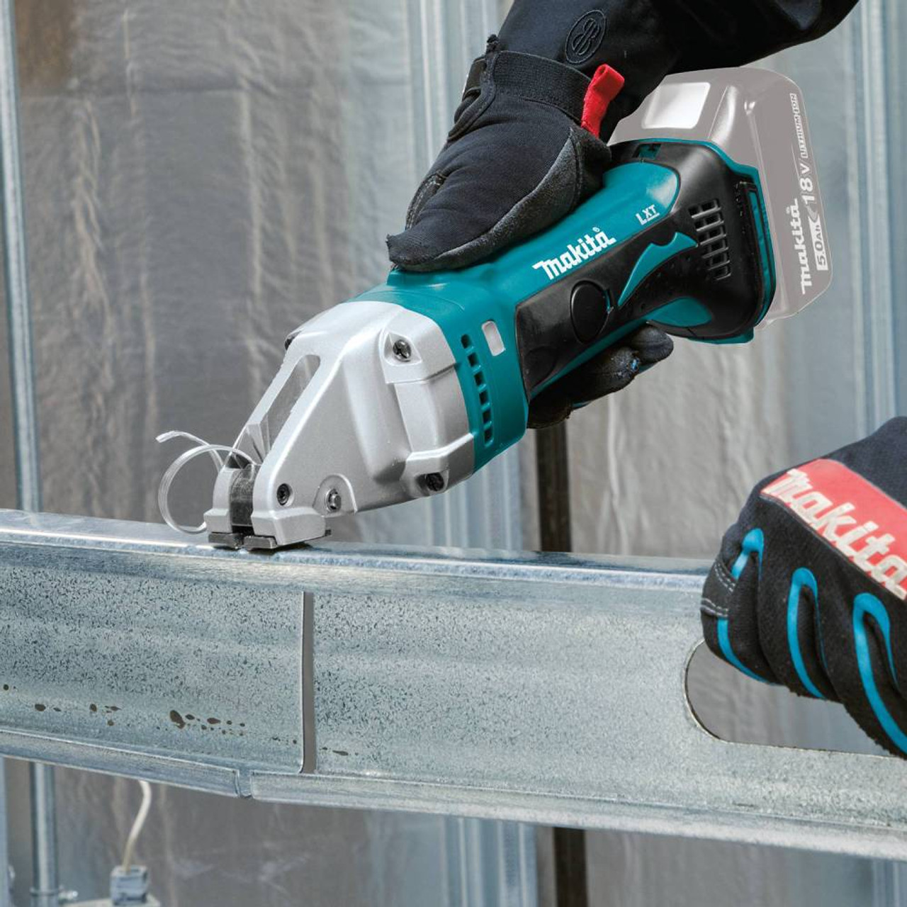 Makita DJS161Z 18V LXT 16ga Metal Straight Shears (Tool Only) showing in use cutting steel studs (Battery sold separately) Makita DJS161Z 18V LXT 16ga Metal Straight Shears (Tool Only) showing in use cutting steel studs (Battery sold separately)