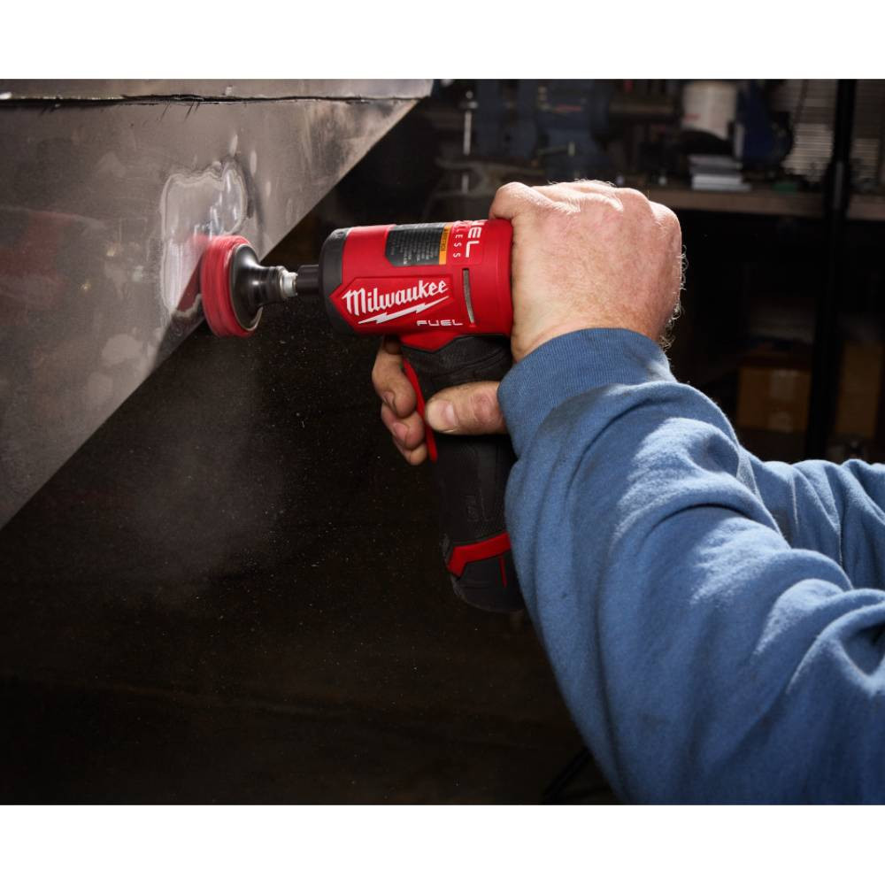 Milwaukee 3485-20 M12 FUEL Cordless 1/4 inch Right Angle Die Grinder (Tool Only) showing showing in use polishing sheet metal