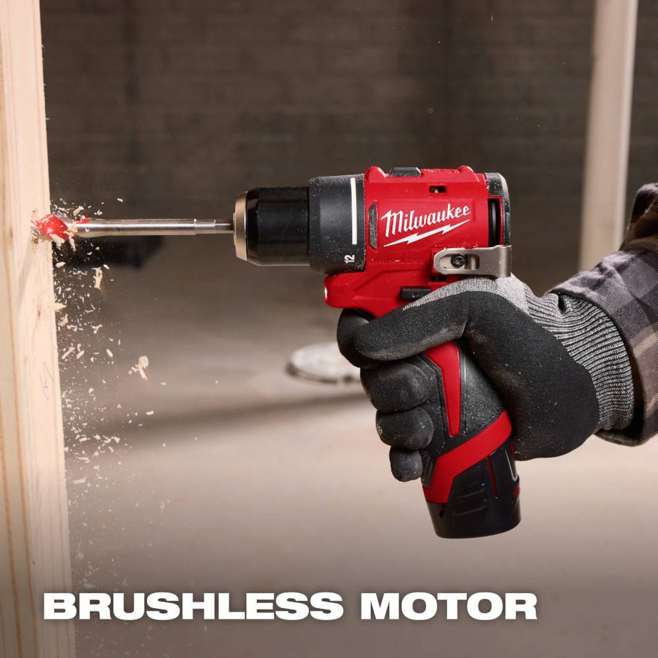 Milwaukee 3494-22 M12 2-Tool Cordless Brushless Subcompact 3/8 inch Drill/Driver & 1/4 inch Hex Impact Driver Combo Kit showing in use drilling into a wood stud