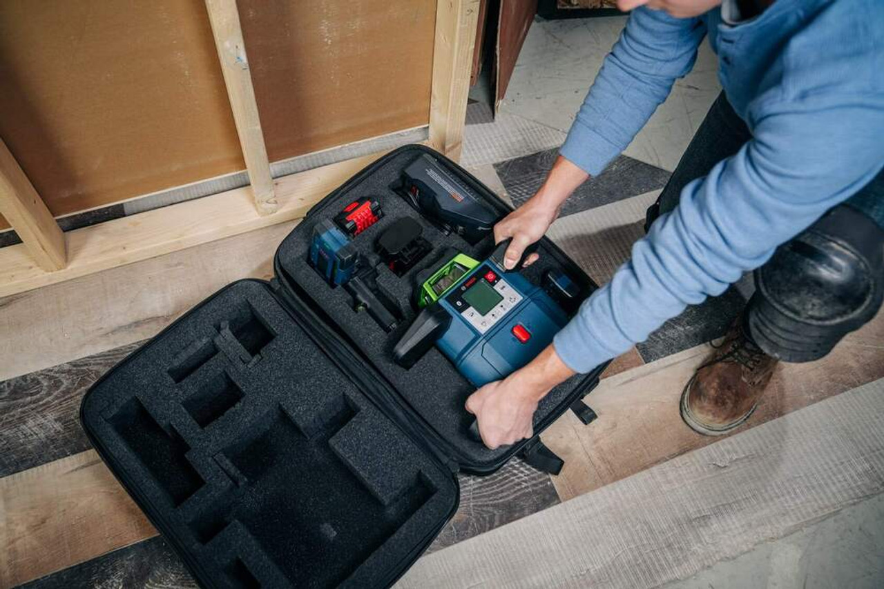 Bosch GBP21-17 Rotary Laser Backpack showing in use with a laser being removed from the fitted foam inside Bosch GBP21-17 Rotary Laser Backpack showing in use with a laser being removed from the fitted foam inside